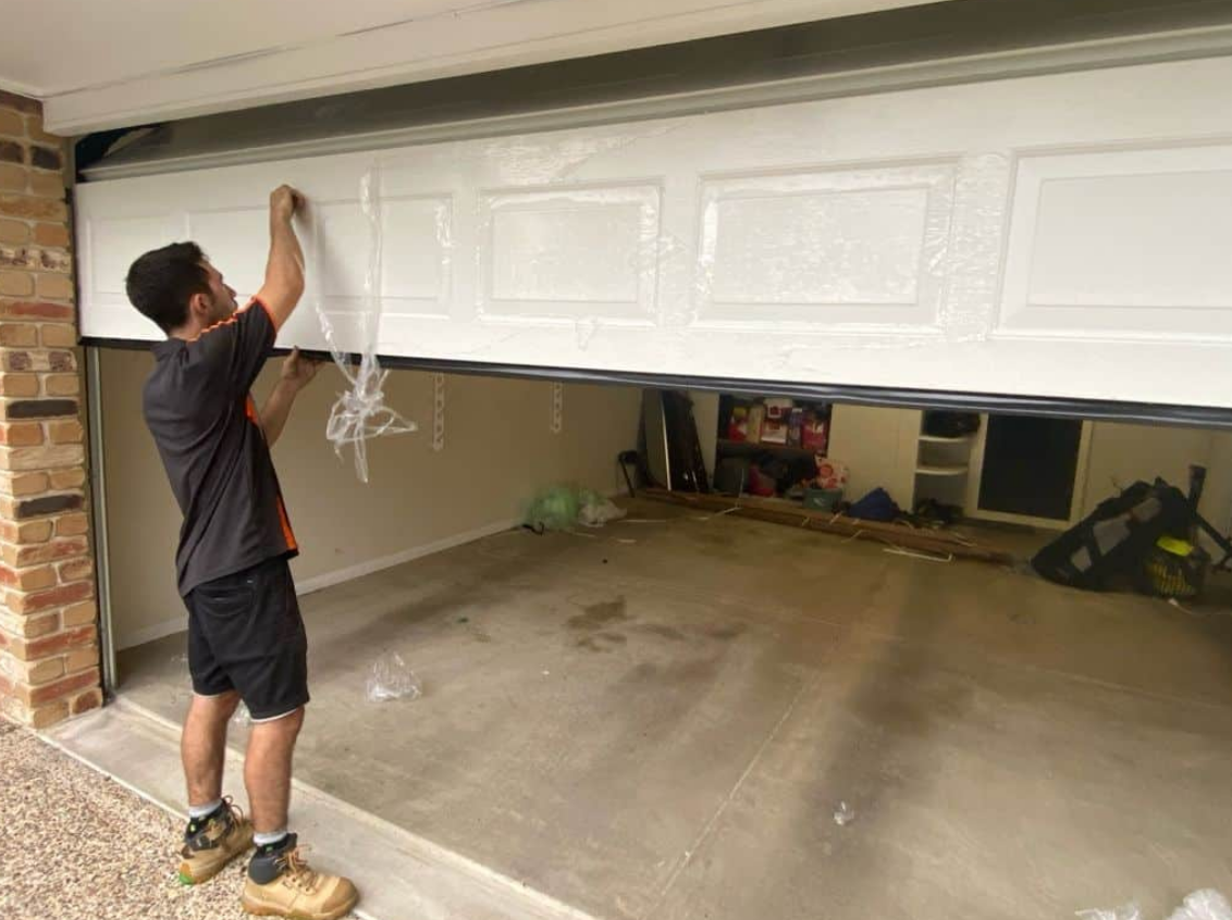 Garage door repair services in Lewis Center for broken springs and openers.
