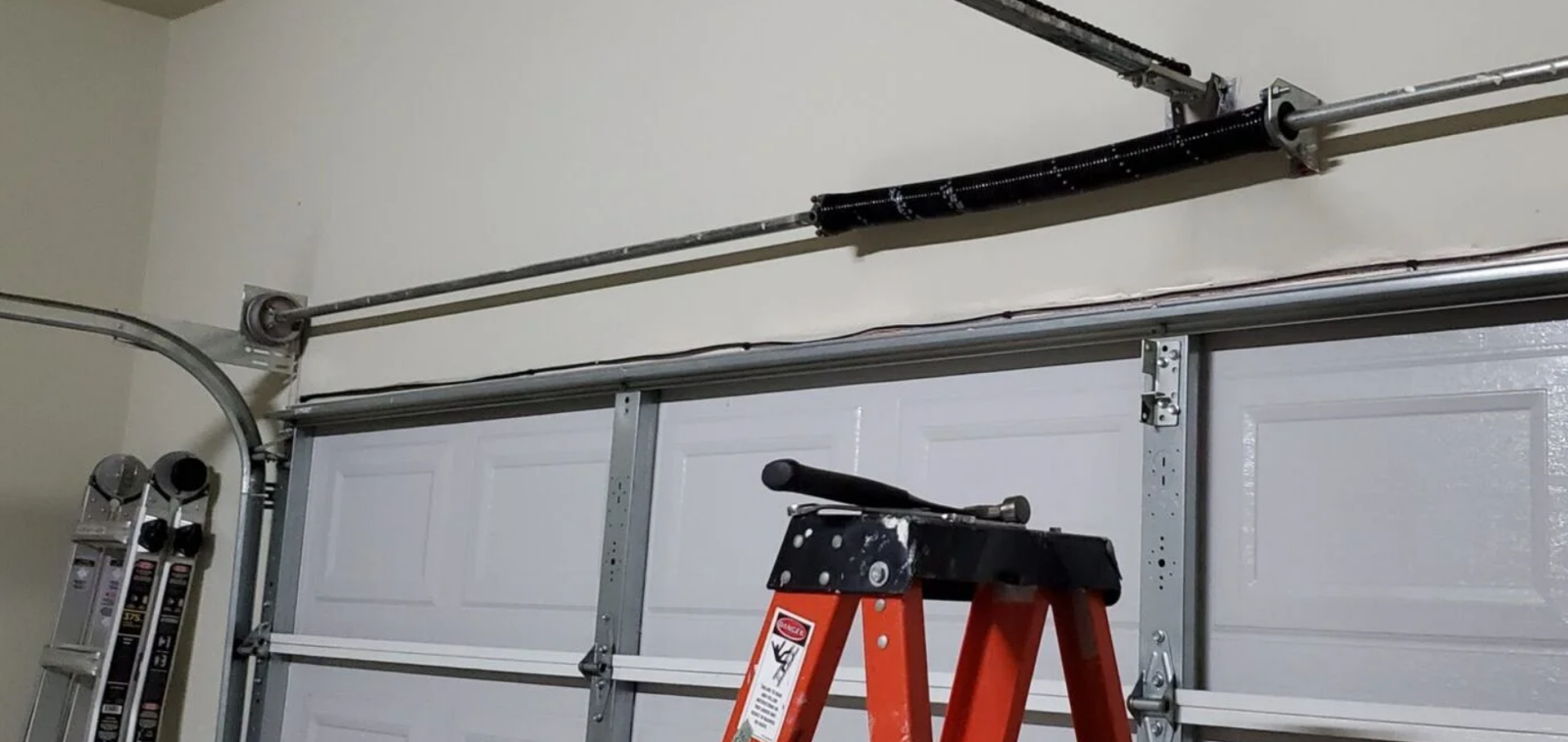 Professional garage door spring repair for residential garages in Lewis Center.