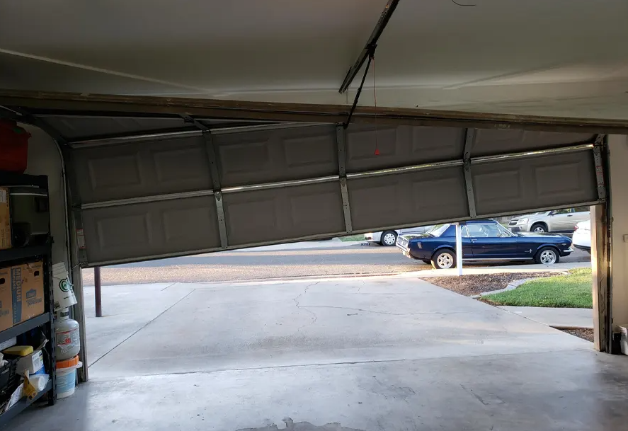 Off-Track Door & Cable Realignment